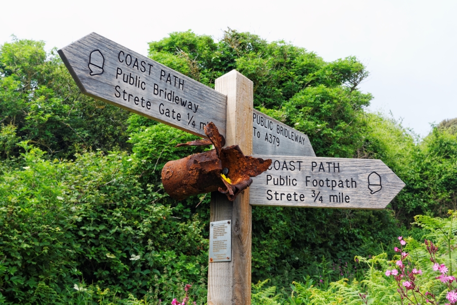 Coast Path signs - pointing left: COAST PATH Public Bridleway to Strete Gate 1/4 miles. Pointing Right: COAST PATH Public Footpath to Strete 3/4 miles. Pointing backwards: PUBLIC BRIDLEWAY to A379