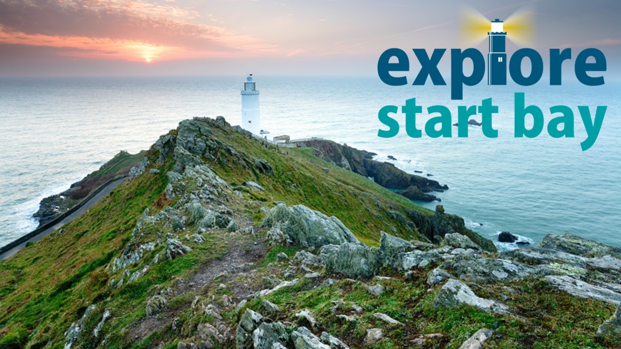 A view to sea from Start Point with a light house in the middle of the image and the Explore Start Bay logo in the top right corner